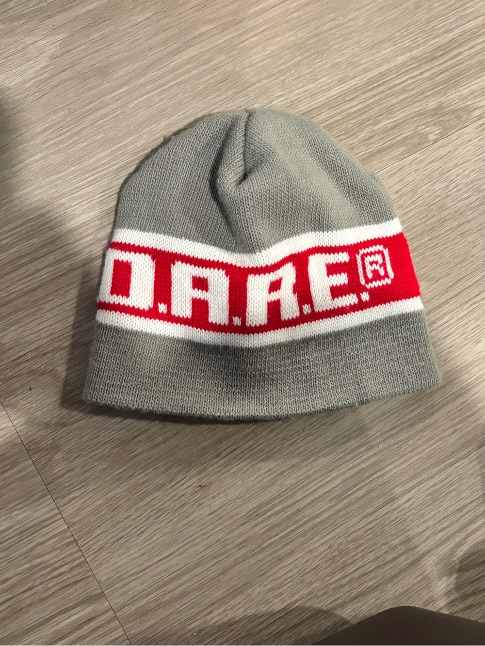 Grey Knit Beanie with Red and White Stripe